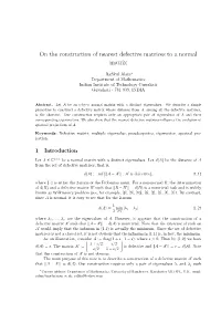 On the Construction of Nearest Defective Matrices to a Normal Matrix