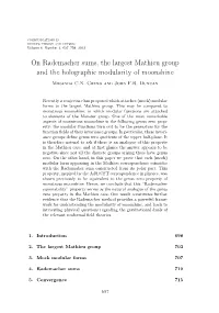 On Rademacher Sums, the Largest Mathieu Group and the Holographic Modularity of Moonshine Miranda C.N