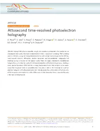 Attosecond Time-Resolved Photoelectron Holography