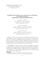 Hilbert Transform and Singular Integrals on the Spaces of Tempered Ultradistributions
