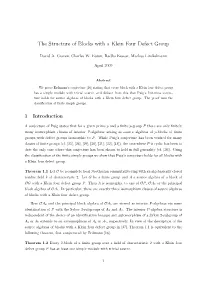 The Structure of Blocks with a Klein Four Defect Group