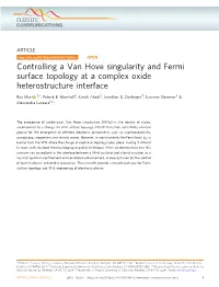 Controlling a Van Hove Singularity and Fermi Surface Topology at a Complex Oxide Heterostructure Interface
