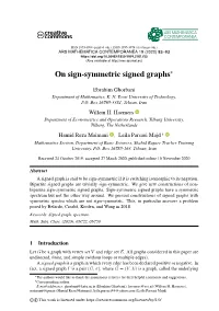 On Sign-Symmetric Signed Graphs∗
