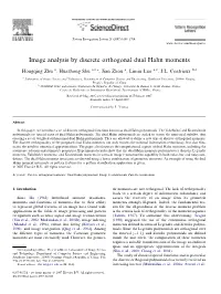 Image Analysis by Discrete Orthogonal Dual Hahn Moments