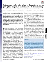 Gain Control Explains the Effect of Distraction in Human Perceptual, Cognitive, and Economic Decision Making