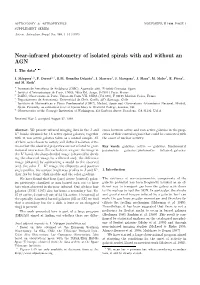 Near-Infrared Photometry of Isolated Spirals with and Without an AGN