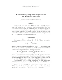 Removability of Point Singularities of Willmore Surfaces