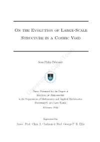 On the Evolution of Large-Scale Structure in a Cosmic Void