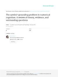 The Symbol-Grounding Problem in Numerical Cognition: a Review of Theory, Evidence, and Outstanding Questions