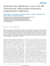 Quantum Key Distribution Over a 40-Db Channel Loss Using Superconducting Single-Photon Detectors