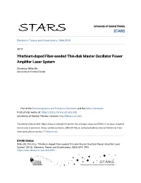 Ytterbium-Doped Fiber-Seeded Thin-Disk Master Oscillator Power Amplifier Laser System