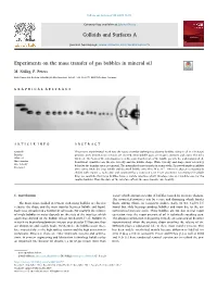 Experiments on the Mass Transfer of Gas Bubbles in Mineral Oil T ⁎ M