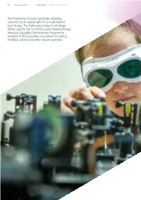 Paul Meekums, a Qinetiq Graduate, Adjusting Elements on an Optical Table for a Multi-Channel Laser Design