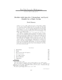 Modules with Injective Cohomology, and Local Duality for a Finite Group