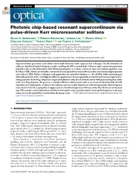 Photonic Chip-Based Resonant Supercontinuum Via Pulse-Driven Kerr Microresonator Solitons Miles H