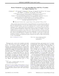 Density Fluctuations Across the Superfluid-Supersolid Phase Transition in a Dipolar Quantum Gas