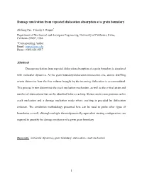 Damage Nucleation from Repeated Dislocation Absorption at a Grain Boundary