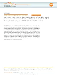 Macroscopic Invisibility Cloaking of Visible Light
