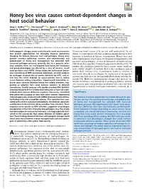 Honey Bee Virus Causes Context-Dependent Changes in Host Social Behavior