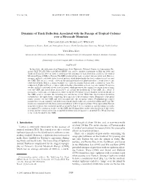 Dynamics of Track Deflection Associated with the Passage of Tropical Cyclones Over a Mesoscale Mountain