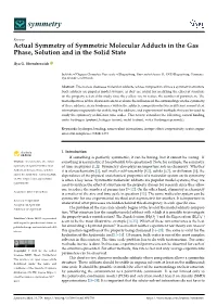 Actual Symmetry of Symmetric Molecular Adducts in the Gas Phase, Solution and in the Solid State