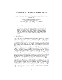 Development of a Verified Flash File System ⋆