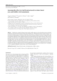 Assessing the Effect of a Fuel Break Network to Reduce Burnt Area and Wildfire Risk Transmission