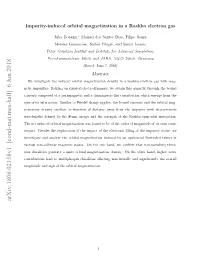 Impurity-Induced Orbital Magnetization in a Rashba Electron Gas