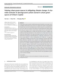 Valuing Urban Green Spaces in Mitigating Climate Change: a City‐ Wide Estimate of Aboveground Carbon Stored in Urban Green Spaces of China's Capital