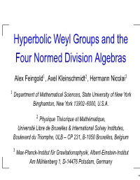Hyperbolic Weyl Groups and the Four Normed Division Algebras