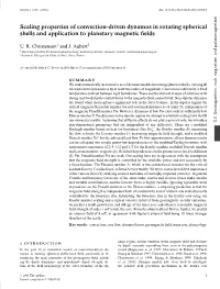 Scaling Properties of Convection-Driven Dynamos in Rotating Spherical Shells and Application to Planetary Magnetic Fields
