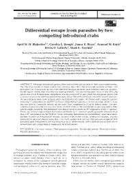 Differential Escape from Parasites by Two Competing Introduced Crabs