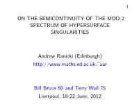 On the Semicontinuity of the Mod 2 Spectrum of Hypersurface Singularities